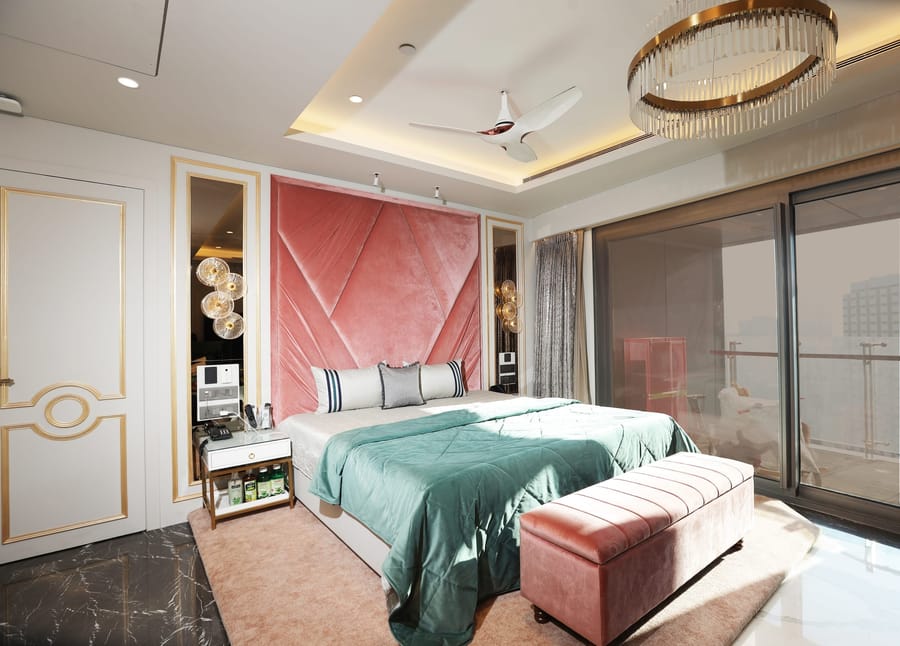 Master bedroom complete furnishing — curtains, headboard and soft furnishings, luxury suite