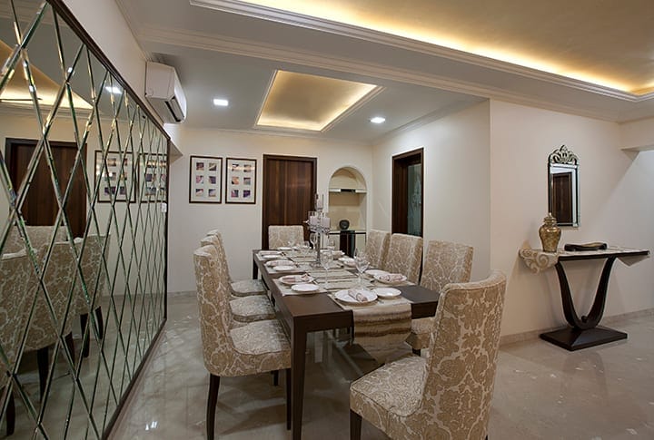 Damask upholstered custom dining chairs and console table, Mumbai residence